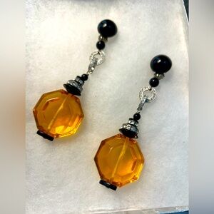 Gold and black clip on dangles with rhinestones